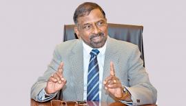 විදේශ අමා­ත්‍යාං­ශයේ ලේකම් අද්මි­රාල් මහා­චාර්ය ජය­නාත් කොළ­ඹගේ 